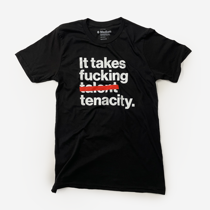 It takes tenacity. Unisex T-Shirt